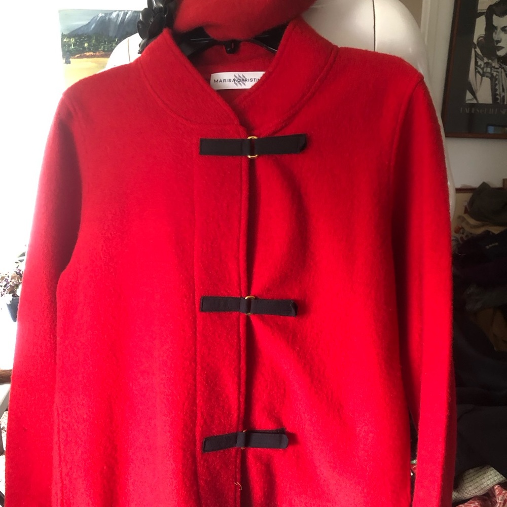 Jacket swing and beret.
